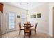 Cozy breakfast nook with a round table and natural light at 2207 Wimberly Woods Dr, Sanford, NC 27330