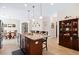 Kitchen island with granite countertops and stainless steel sink at 2207 Wimberly Woods Dr, Sanford, NC 27330