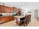 Well-lit kitchen featuring granite counters, tile backsplash, and stainless steel appliances at 2207 Wimberly Woods Dr, Sanford, NC 27330