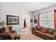 Cozy living room with comfortable seating, ample natural light, and neutral decor at 2207 Wimberly Woods Dr, Sanford, NC 27330