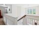 Bright stairway landing with a large window and natural light at 2207 Wimberly Woods Dr, Sanford, NC 27330