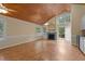 Inviting living room with wood floors, fireplace, and abundant natural light at 222 Sagamore Dr, Louisburg, NC 27549