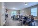 Open-concept living room featuring hardwood floors, fireplace, and abundant natural light at 2459 Bay Harbor Dr, Raleigh, NC 27604