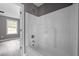 Bright bathroom featuring a white tub and shower combo perfect for relaxation at 249 Fisherman Point Rd, Roxboro, NC 27574