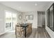 Lovely dining room with outside views and easy access to the back deck at 260 Day Farm Dr, Lillington, NC 27546