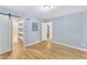 This bedroom has a closet with a sliding door and a door to another room at 2600 Wade Ave, Raleigh, NC 27607