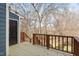 Private wooden deck with brown wooden rails, perfect for outdoor entertaining at 2835 Bedfordshire Ct, Raleigh, NC 27604