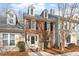 Charming brick townhome with a well-manicured front yard and inviting entrance at 2835 Bedfordshire Ct, Raleigh, NC 27604