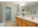 Spacious bathroom with double vanity, walk in shower, and ample storage space at 303 Laurens Way, Chapel Hill, NC 27516