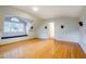 Spacious bonus room features hardwood floors, window seat, and access door to an outdoor deck at 303 Laurens Way, Chapel Hill, NC 27516