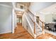 Grand foyer with hardwood floors, staircase, and natural light at 303 Laurens Way, Chapel Hill, NC 27516