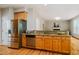 Well-appointed kitchen with stainless steel appliances, granite countertops, and ample cabinet space at 303 Laurens Way, Chapel Hill, NC 27516