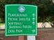 Community sign directing to playground, picnic shelter, sports fields, and dog park at 303 Laurens Way, Chapel Hill, NC 27516