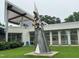 Artistic sculpture in front of a community building, adding charm to the surroundings at 303 Laurens Way, Chapel Hill, NC 27516