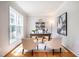 Cozy study with ample natural light, hardwood flooring, and neutral decor at 303 Laurens Way, Chapel Hill, NC 27516