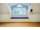 Bonus room window seat provides ample natural light and built-in seating at 303 Laurens Way, Chapel Hill, NC 27516