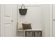 Bright mudroom featuring storage baskets, bench, and decor at 308 Canyon Spring Trl, Wake Forest, NC 27587