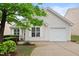 Charming single-story home featuring light siding, a one car garage, and a well-maintained front yard with manicured shrubs at 3108 Forrestal Dr, Durham, NC 27703