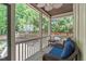 Screened in porch with tile floors, wicker furniture and a great view of the backyard at 3304 Rockland Ridge Dr, Cary, NC 27519