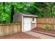 A charming shed tucked away in the yard, providing ample storage space and blending seamlessly with the landscape at 3304 Rockland Ridge Dr, Cary, NC 27519