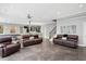 Expansive basement featuring a wet bar, pool table, and comfortable seating area at 3601 Nightfall Ct, Raleigh, NC 27607