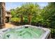 Soak in this built-in backyard hot tub surrounded by mature landscaping for privacy and relaxation at 3601 Nightfall Ct, Raleigh, NC 27607
