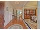 Elegant foyer with hardwood floors, chandelier, and seamless flow into the dining and living areas at 372 Farnleigh Dr, Chapel Hill, NC 27517
