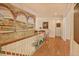 Elegant hallway with a painted mural, hardwood floors, and decorative details on the walls at 372 Farnleigh Dr, Chapel Hill, NC 27517