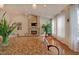 Spacious living area features a stone fireplace, hardwood floors, and a comfortable white sofa at 372 Farnleigh Dr, Chapel Hill, NC 27517