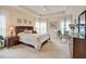 Serene main bedroom with tray ceilings, soft carpeting, and an abundance of natural light at 372 Farnleigh Dr, Chapel Hill, NC 27517