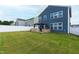Spacious, fenced backyard with a well-manicured lawn, featuring a gazebo ideal for outdoor enjoyment at 3913 Massey Pointe Ct, Raleigh, NC 27616