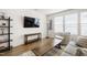 Cozy living room with wood floors, a comfortable seating area, and plenty of natural light at 3913 Massey Pointe Ct, Raleigh, NC 27616