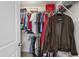 Walk in closet with wire shelving, and hanging clothes at 3913 Massey Pointe Ct, Raleigh, NC 27616