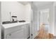 Laundry room featuring a newer washer and dryer, with great lighting and plenty of space at 407 Sparella St, Durham, NC 27703
