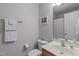 Bright bathroom with single sink, cabinet, toilet, and shower-tub combination at 408 Dairy Farm Dr, Hillsborough, NC 27278