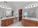 Large bathroom with dual sinks, vanity area, walk-in shower, and tile flooring at 408 Dairy Farm Dr, Hillsborough, NC 27278