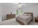 Bedroom featuring natural light, a ceiling fan, and a comfortable bed at 408 Dairy Farm Dr, Hillsborough, NC 27278