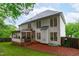 This home has a large backyard, a grill on the deck, and lots of windows for natural light at 408 Dairy Farm Dr, Hillsborough, NC 27278