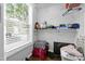 Walk-in closet featuring a window and shelving, perfect for storage and organization at 4104 Panther Creek Pkwy, Durham, NC 27704