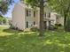 Charming two-story home featuring neutral siding, black shutters, and a well-maintained lawn at 4104 Panther Creek Pkwy, Durham, NC 27704