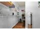 Spacious walk-in closet with wire shelving, storage, and hardwood flooring at 4104 Panther Creek Pkwy, Durham, NC 27704