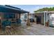 Inviting back deck with outdoor seating, a covered gazebo, and a grill at 4125 Brushy Ridge Dr, Holly Springs, NC 27540