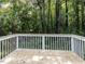 The back deck has views of a lush, green, treed area at 4206 Camden Woods Ct, Raleigh, NC 27612