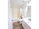 Bright bathroom with a shower and a vanity with a sink at 4206 Camden Woods Ct, Raleigh, NC 27612
