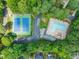 Aerial view showing the community pool, tennis courts, and parking area at 4500 Lancashire Dr, Raleigh, NC 27613
