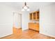 Dining room with hardwood floors and built-in cabinet at 4500 Lancashire Dr, Raleigh, NC 27613