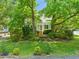 Well-maintained home with landscaped front yard and welcoming front porch at 4500 Lancashire Dr, Raleigh, NC 27613