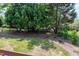 View of wooded backyard with wrought iron fence at 4953 Mashpee Ln, Apex, NC 27539