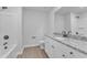 Bright bathroom featuring a granite vanity, wood-look floors and a shower-tub combo at 501 Benton Dr, Oxford, NC 27565