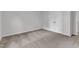A comfortable bedroom with neutral carpet, white trim and a double-door closet at 501 Benton Dr, Oxford, NC 27565